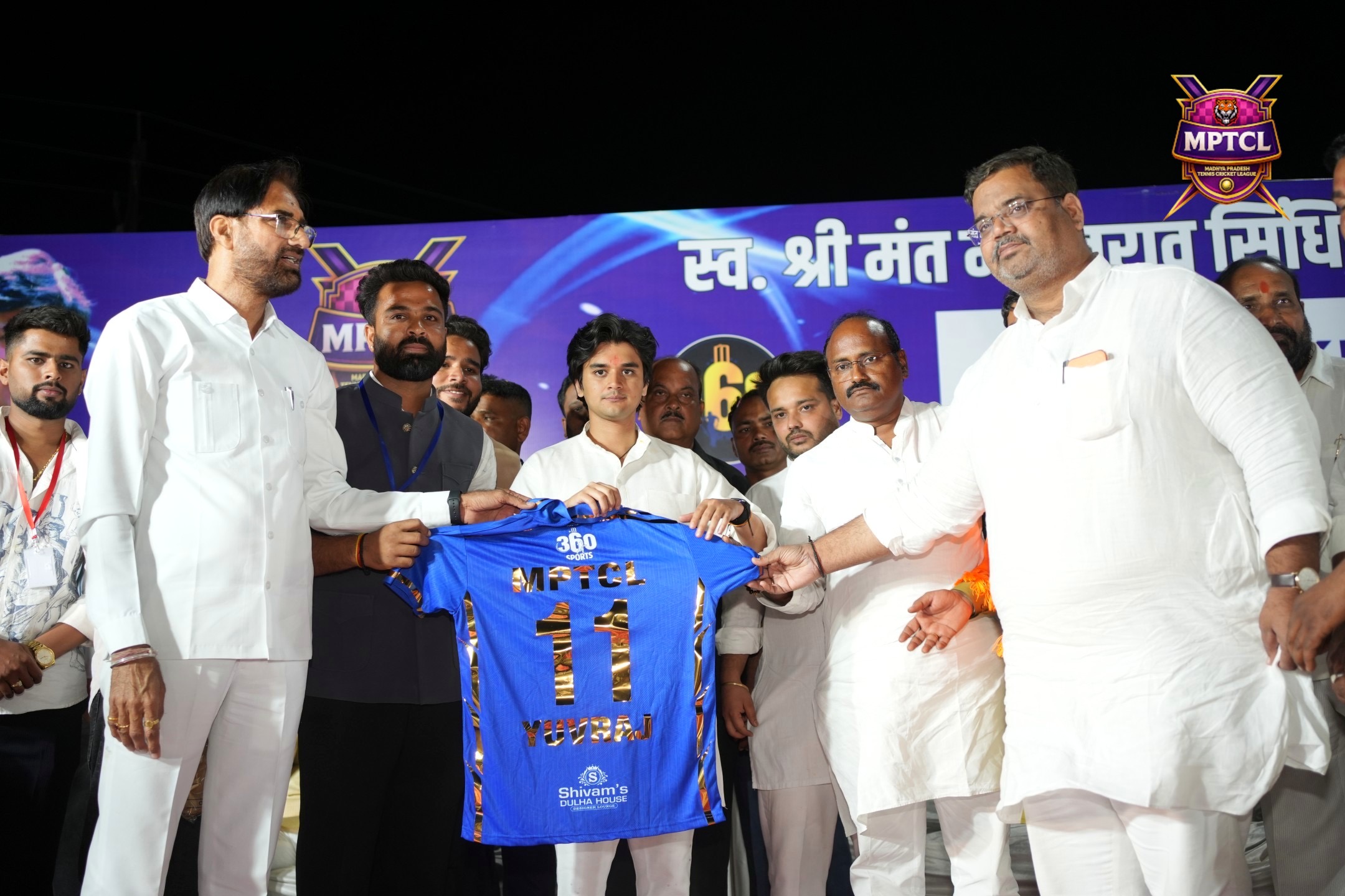 Jersey handover moment at MPTCL 2025