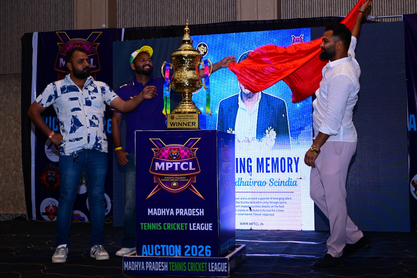 Auction paddles raised during MPTCL 2025